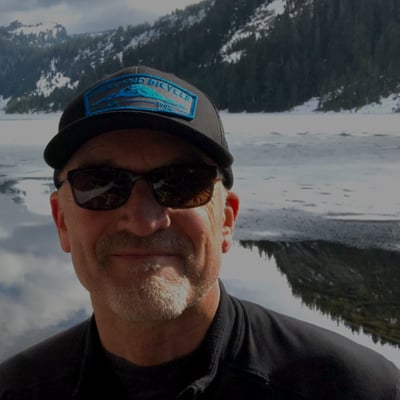 John hiking in the mountains